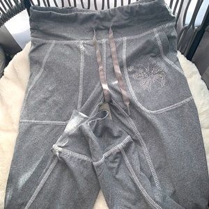 Gray rue 21 pants with bedazzled butterfly